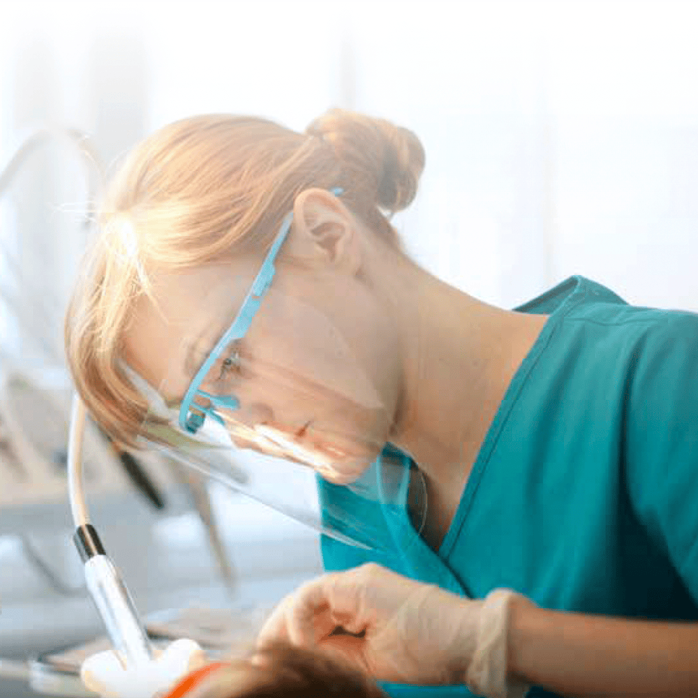 dentist works on a patients mouth