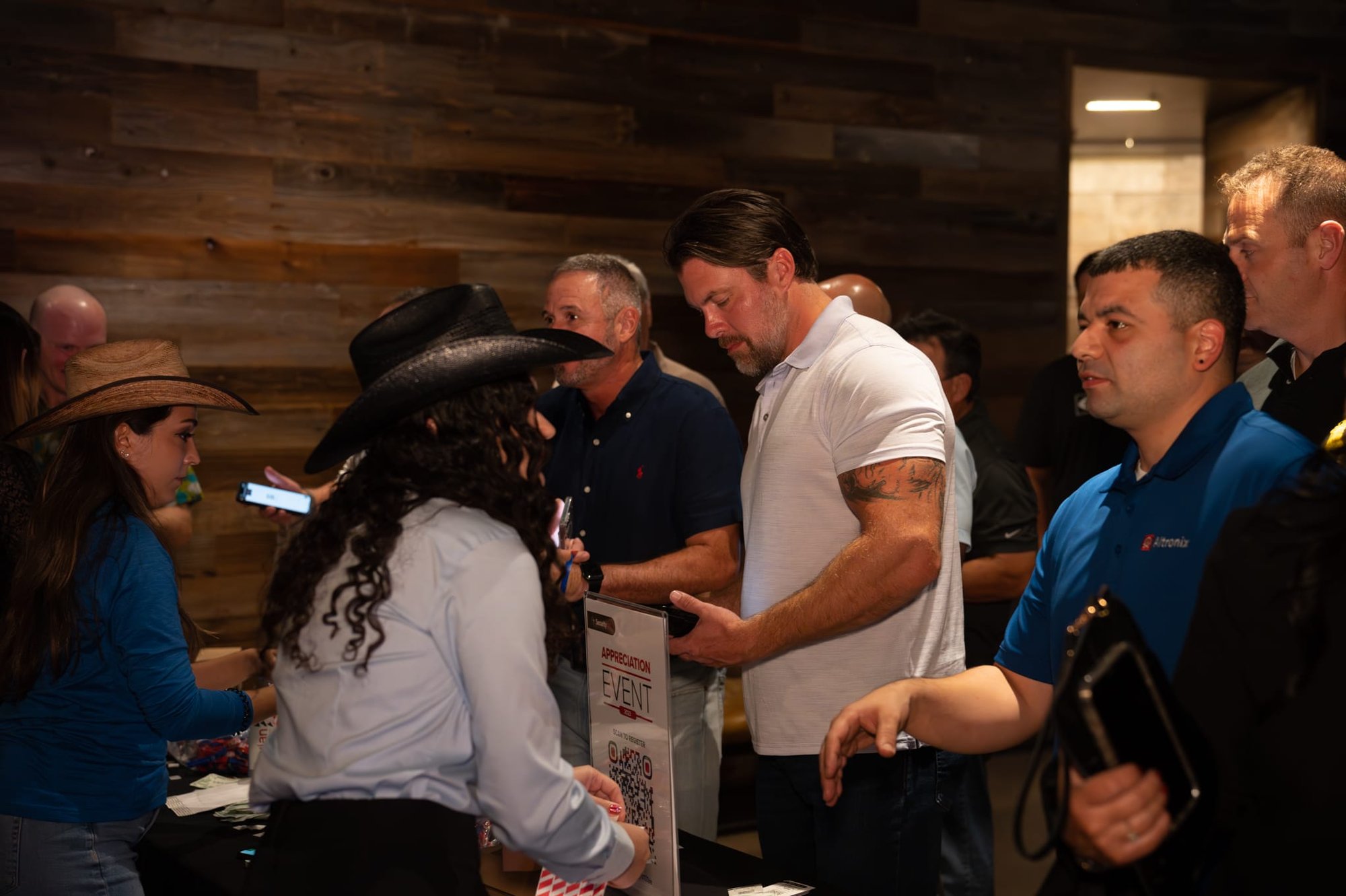 Candid shot of attendees of Security 101 Appreciation Event at Happiest Hour in Dallas, TX