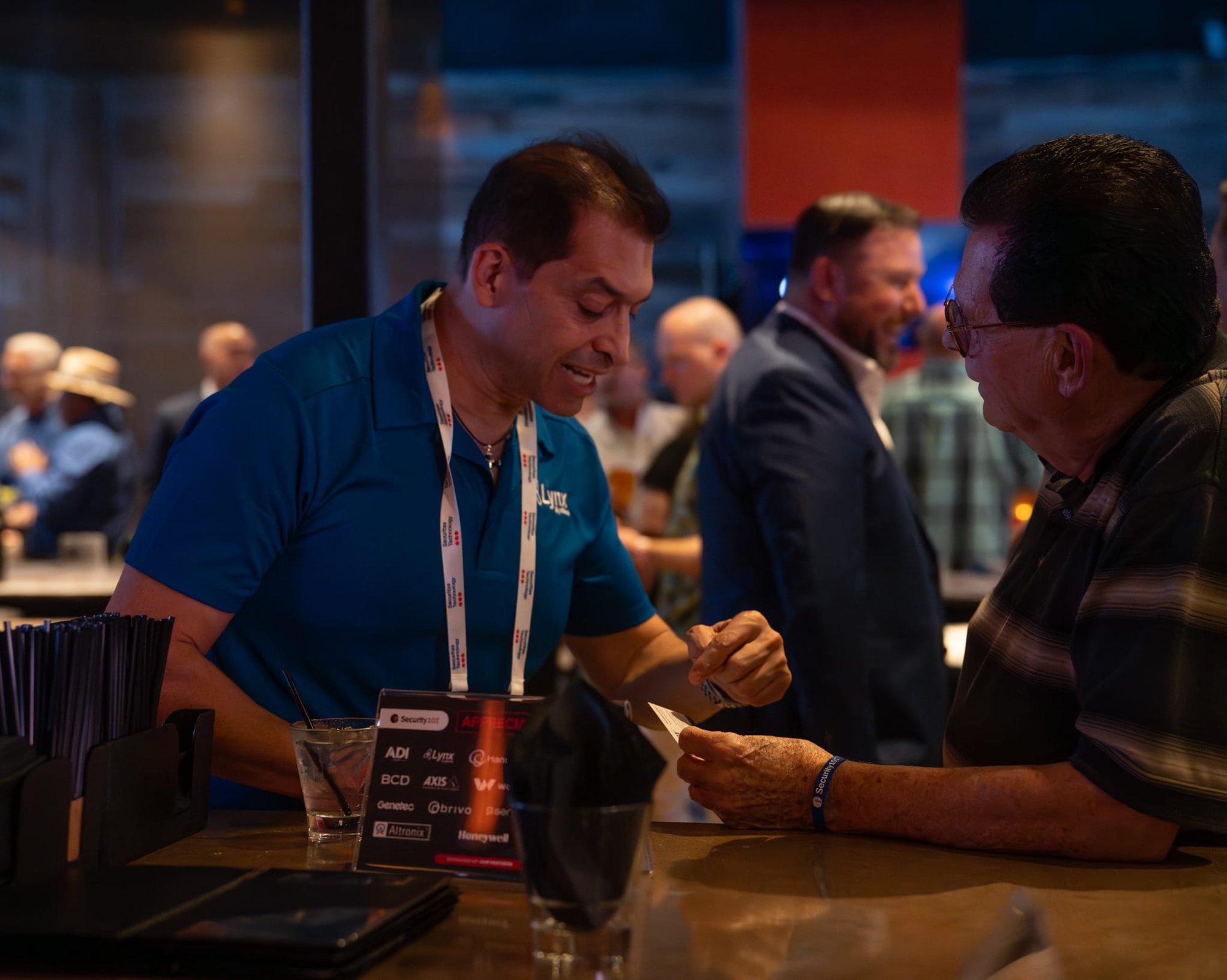 Candid shot of attendees of Security 101 Appreciation Event at Happiest Hour in Dallas, TX