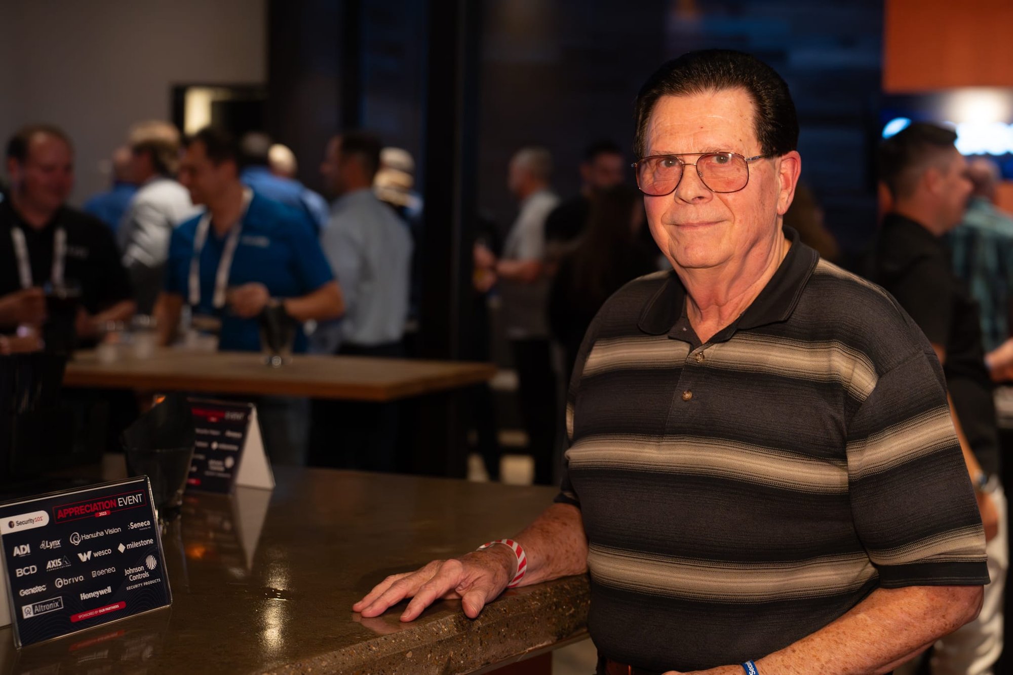 Candid shot of attendees of Security 101 Appreciation Event at Happiest Hour in Dallas, TX