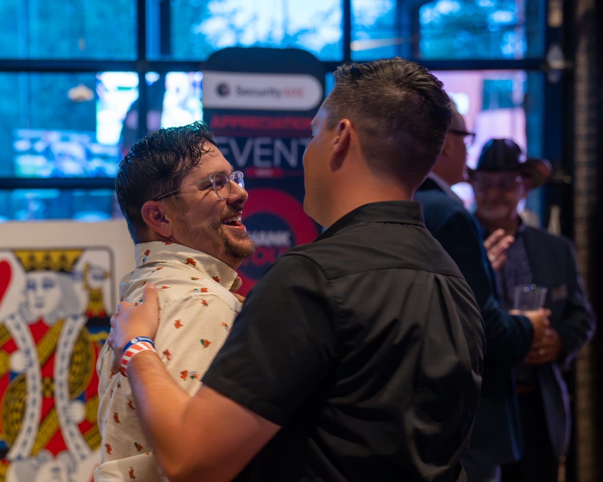 Candid shot of attendees of Security 101 Appreciation Event at Happiest Hour in Dallas, TX