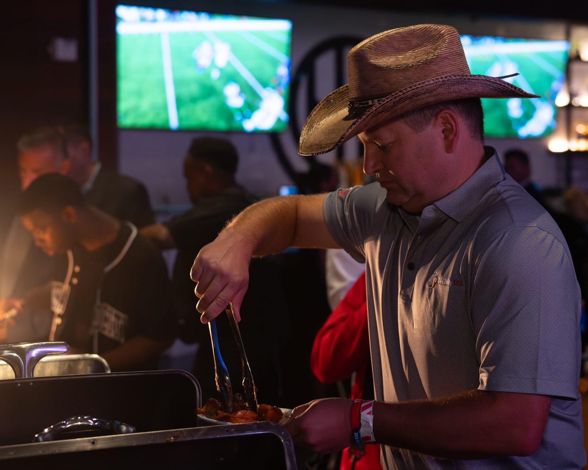 Candid shot of attendees of Security 101 Appreciation Event at Happiest Hour in Dallas, TX