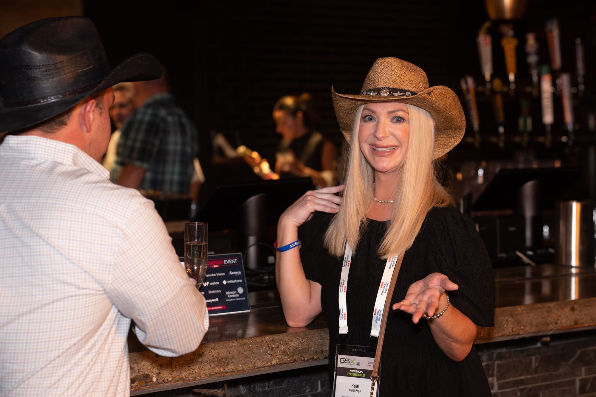 Candid shot of attendees of Security 101 Appreciation Event at Happiest Hour in Dallas, TX