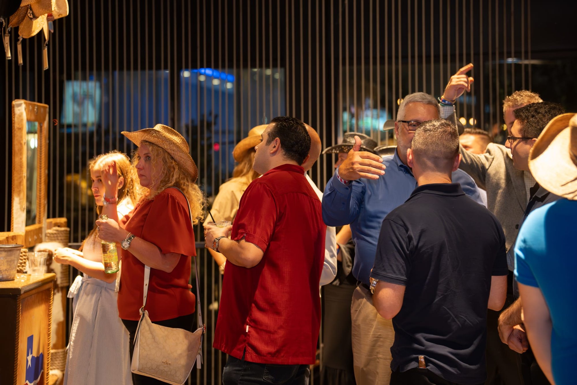 Candid shot of attendees of Security 101 Appreciation Event at Happiest Hour in Dallas, TX