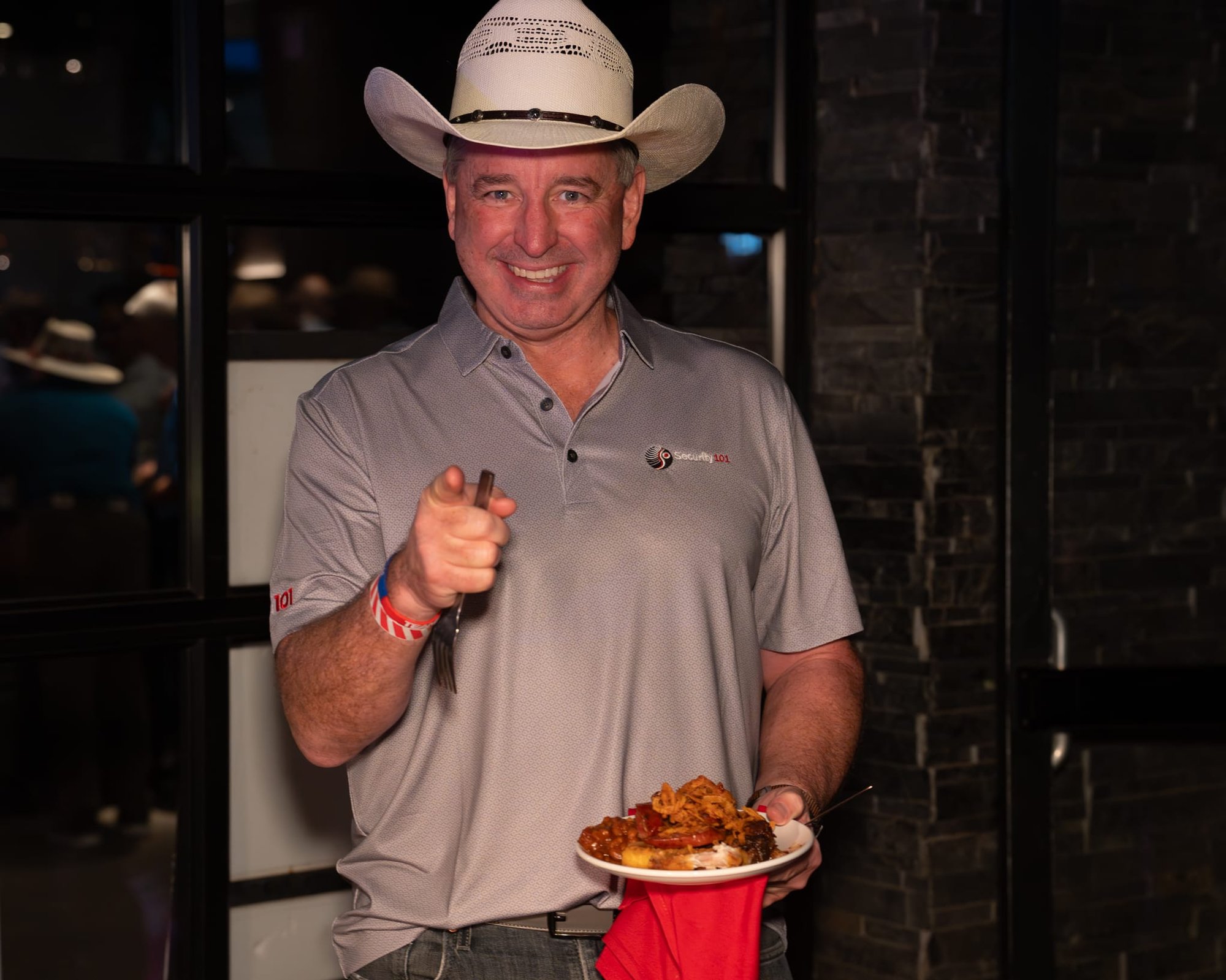 Candid shot of attendees of Security 101 Appreciation Event at Happiest Hour in Dallas, TX