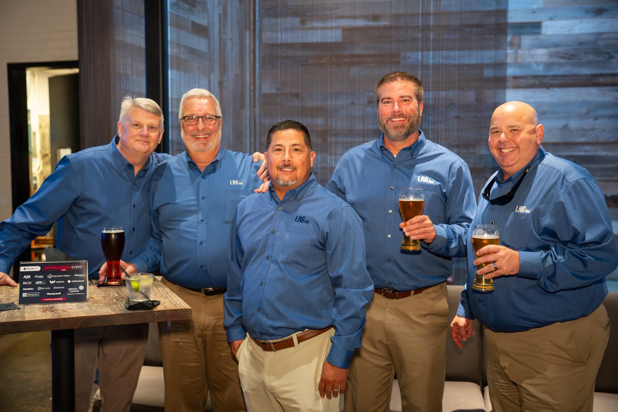 Candid shot of attendees of Security 101 Appreciation Event at Happiest Hour in Dallas, TX