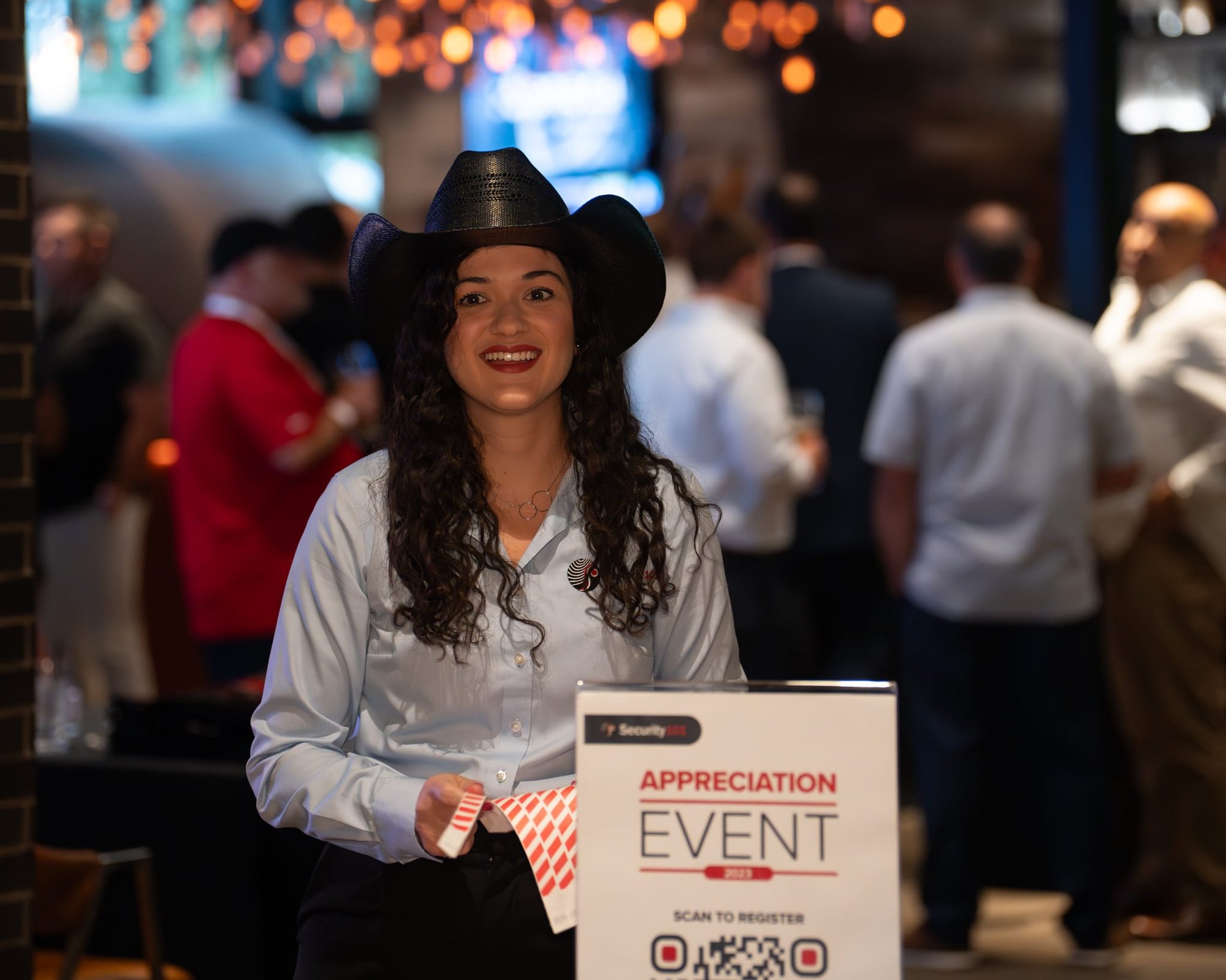 Candid shot of Ana Mercadante at Security 101 Appreciation Event at Happiest Hour in Dallas, TX