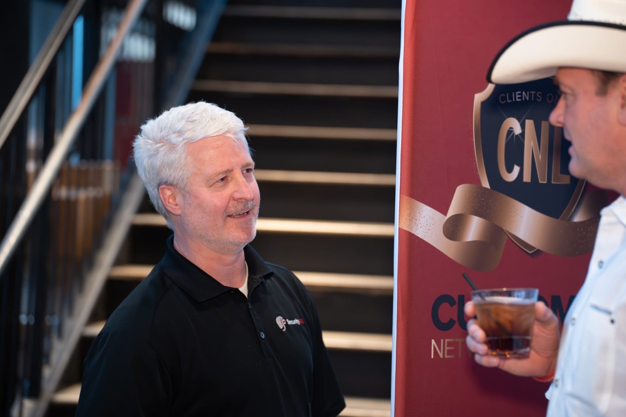 Candid shot of attendees of Security 101 Appreciation Event at Happiest Hour in Dallas, TX