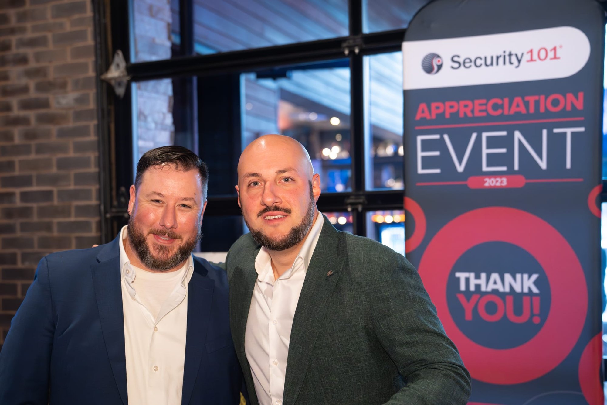 Candid shot of attendees of Security 101 Appreciation Event at Happiest Hour in Dallas, TX