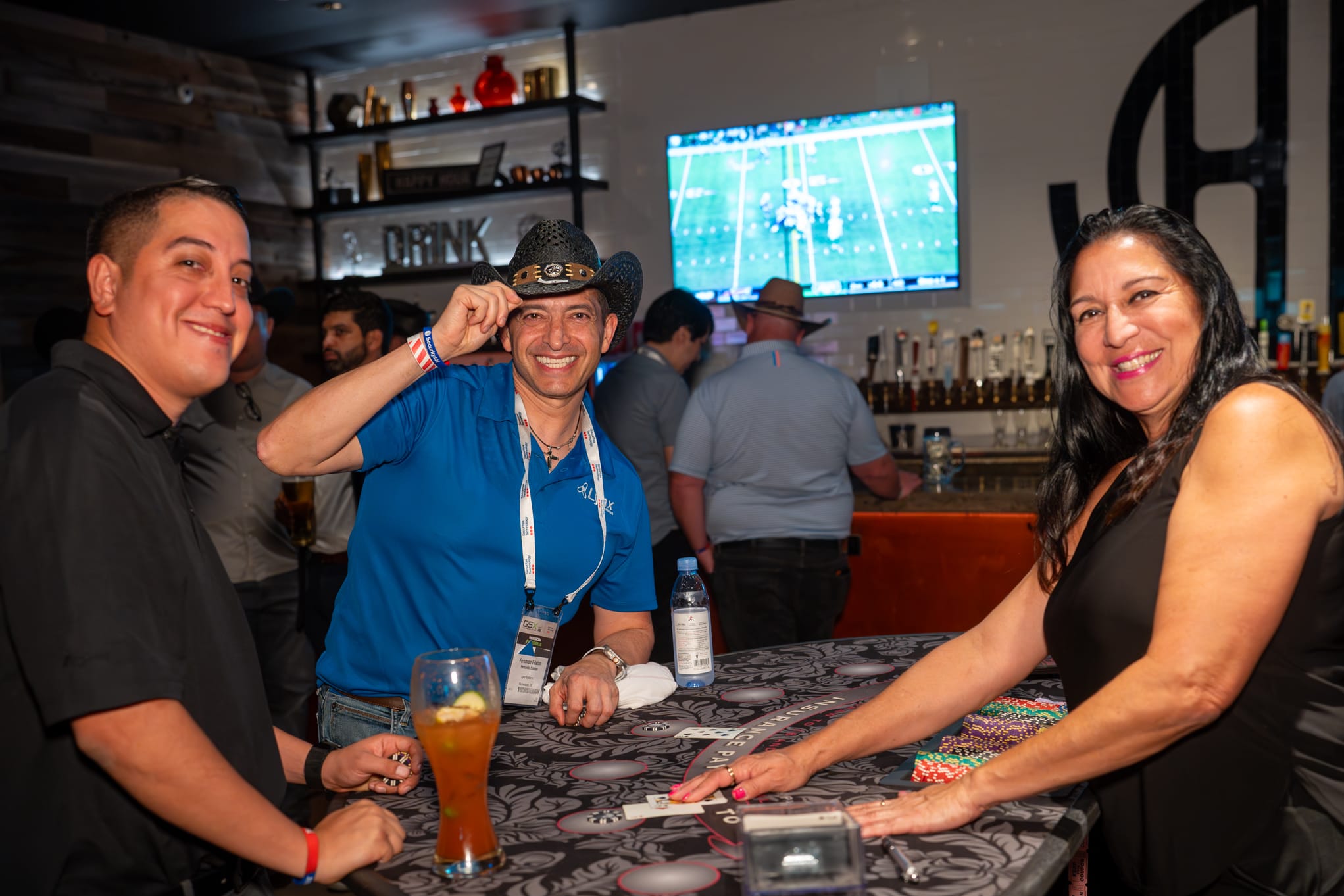 Attendees of Security 101 Appreciation Event participate in casino games at Happiest Hour in Dallas, TX