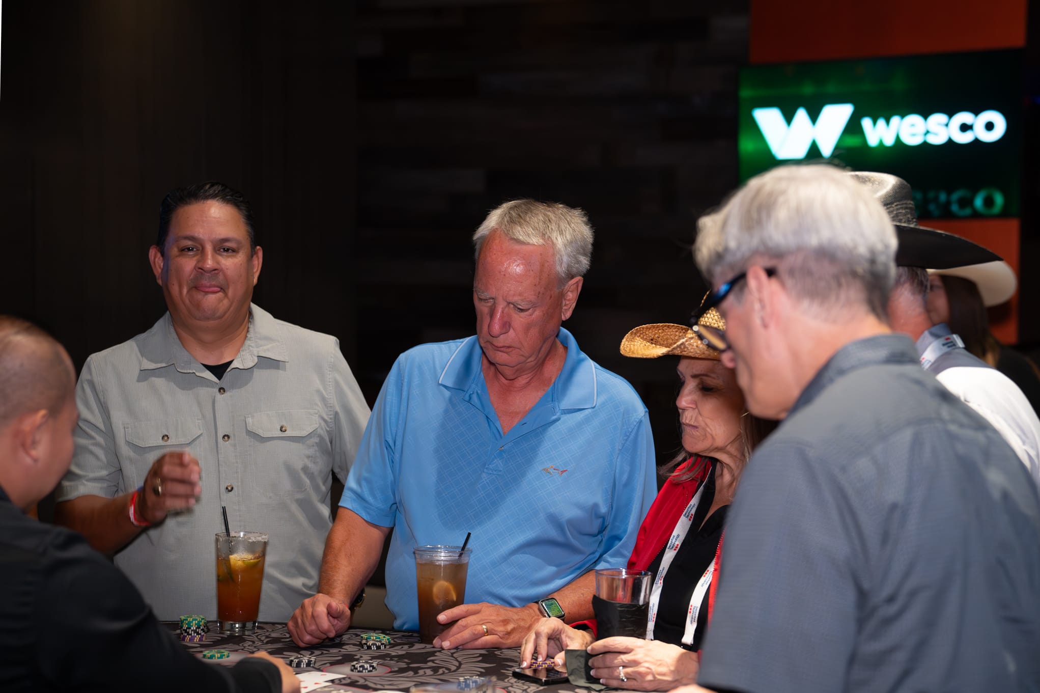 Attendees of Security 101 Appreciation Event participate in casino games at Happiest Hour in Dallas, TX