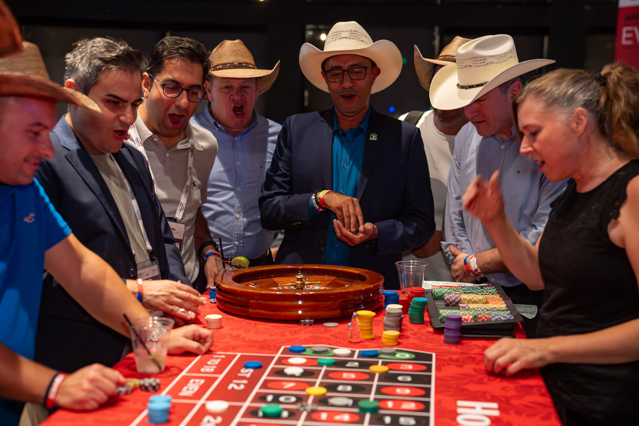 Attendees of Security 101 Appreciation Event participate in casino games at Happiest Hour in Dallas, TX