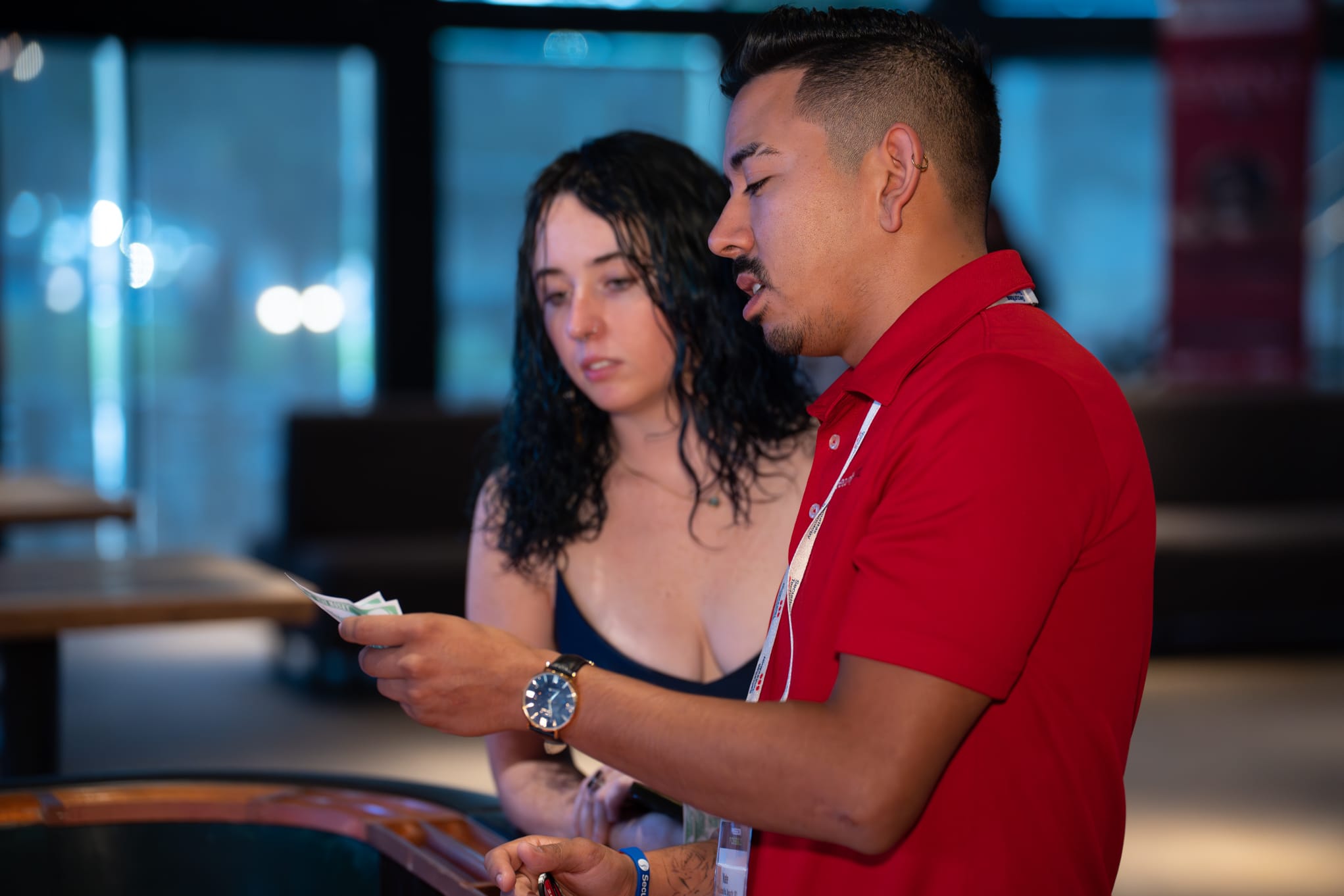 Attendees of Security 101 Appreciation Event participate in casino games at Happiest Hour in Dallas, TX