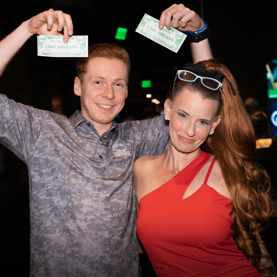 cigar girl poses with attendees of Security 101 Appreciation Event at Happiest Hour in Dallas, TX