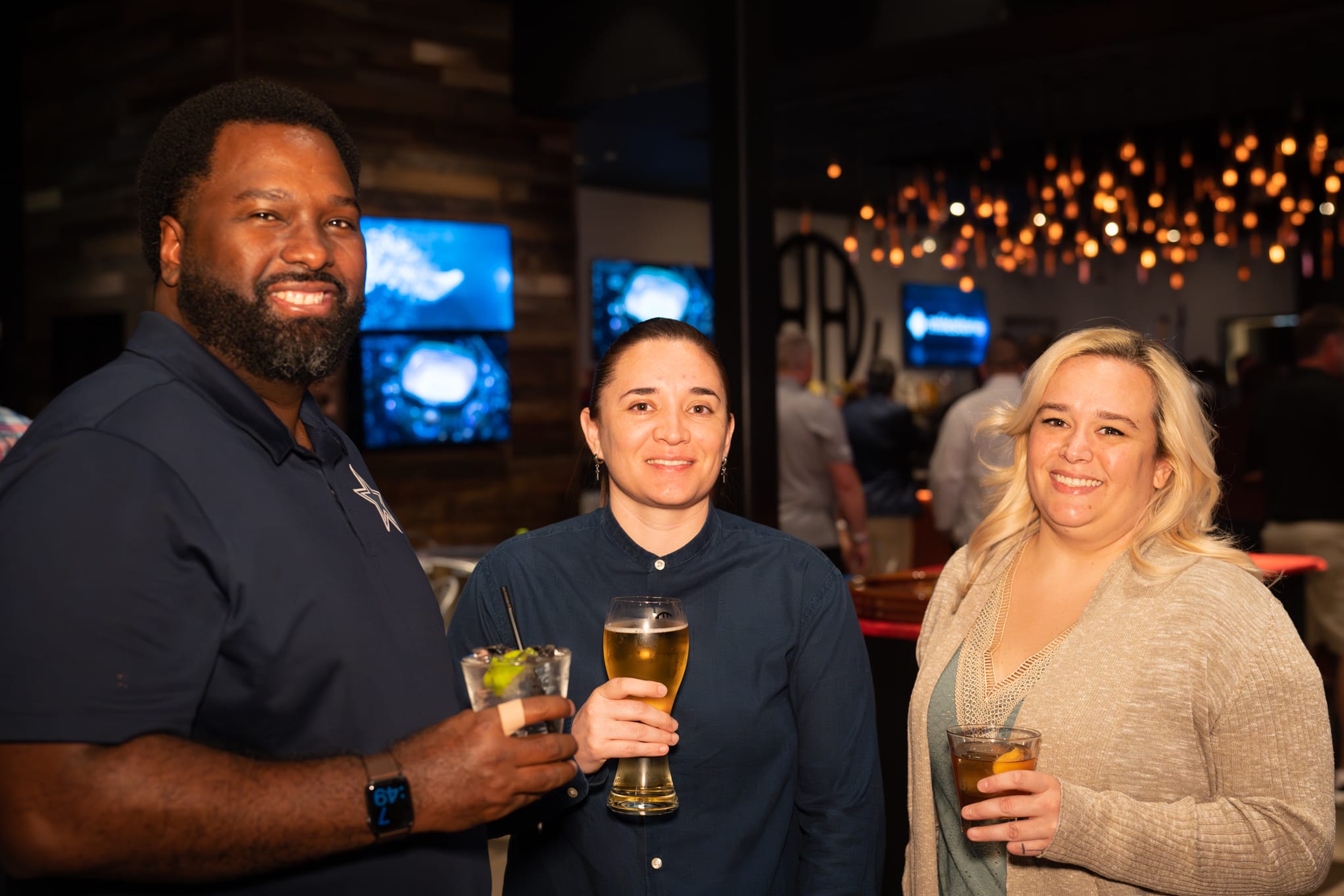 Security 101 Appreciation Event attendees network on the rooftop patio of Happiest Hour in Dallas, TX