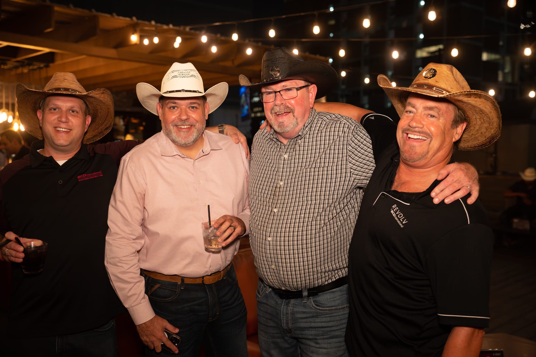 Security 101 Appreciation Event attendees network on the rooftop patio of Happiest Hour in Dallas, TX