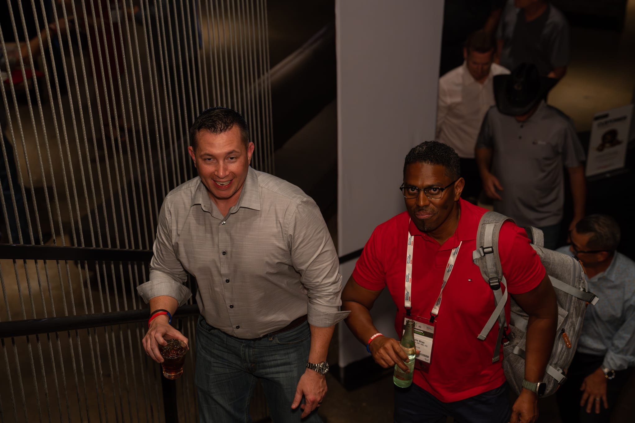 Security 101 Appreciation Event attendees head up to the rooftop patio of Happiest Hour in Dallas, TX