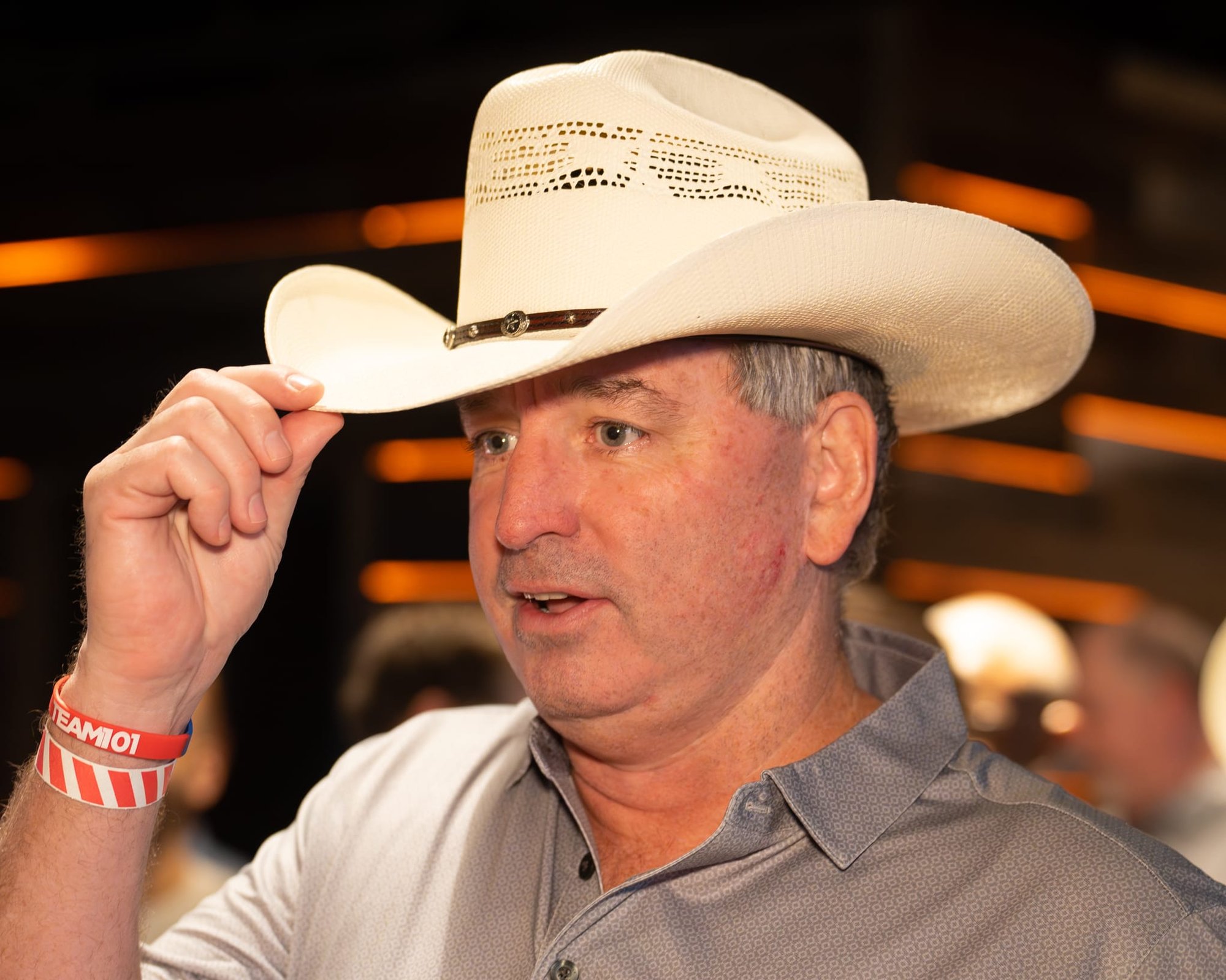 Wild Bill makes custom cowboy hats for Security 101’s Appreciation Event attendees at the Happiest Hour rooftop bar