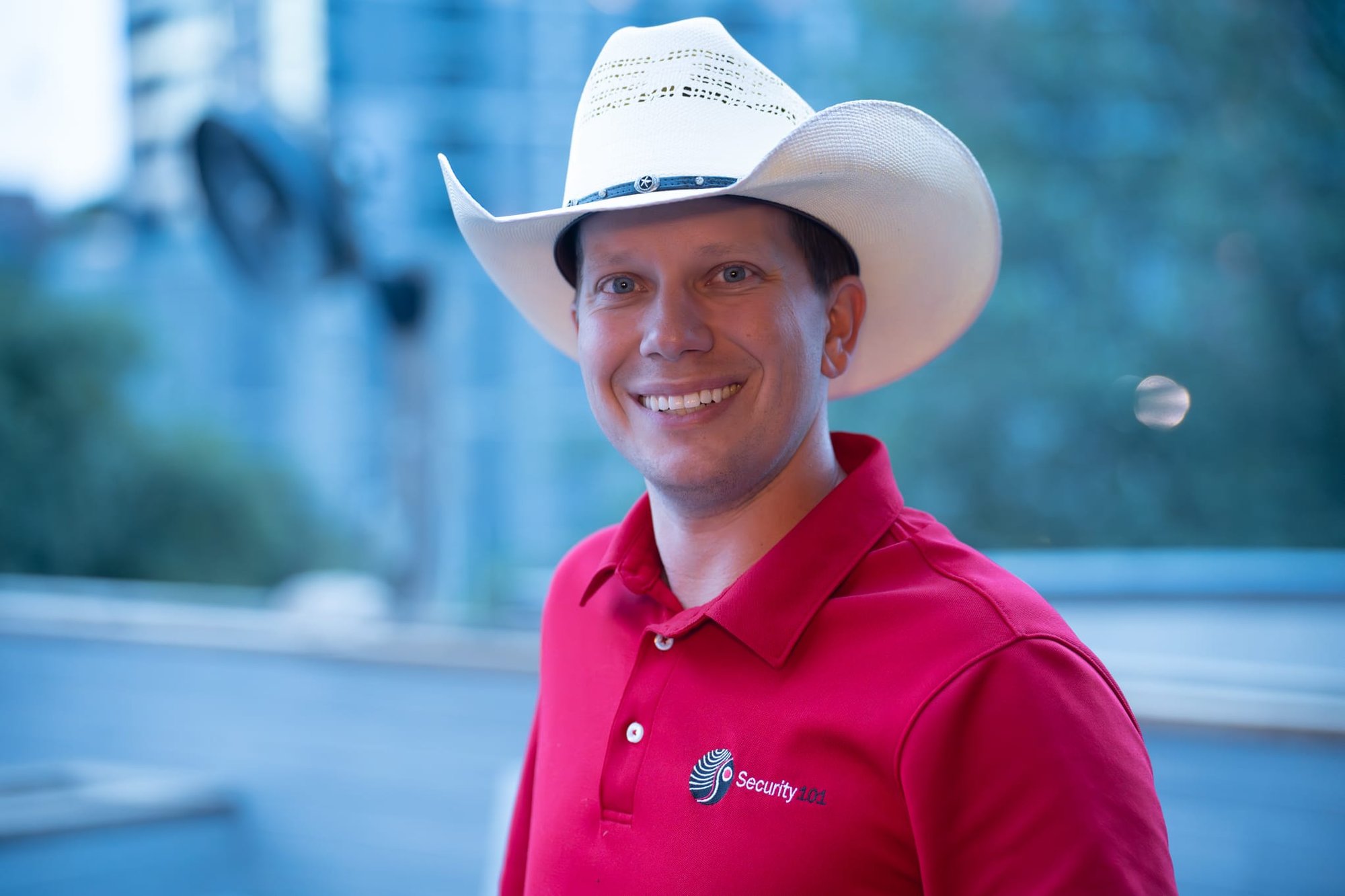 Wild Bill makes custom cowboy hats for Security 101’s Appreciation Event attendees at the Happiest Hour rooftop bar