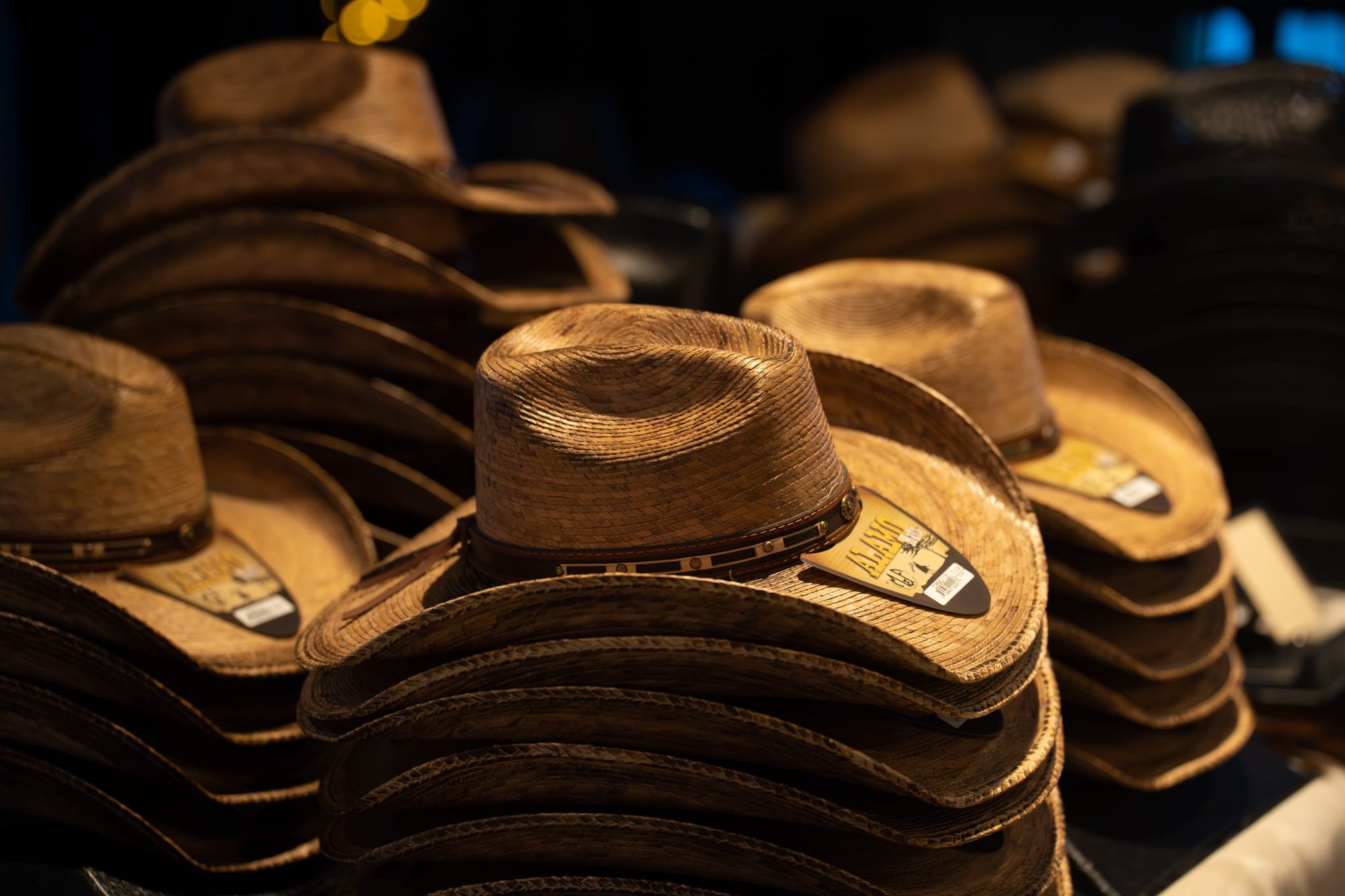 Wild Bill makes custom cowboy hats for Security 101’s Appreciation Event attendees at the Happiest Hour rooftop bar