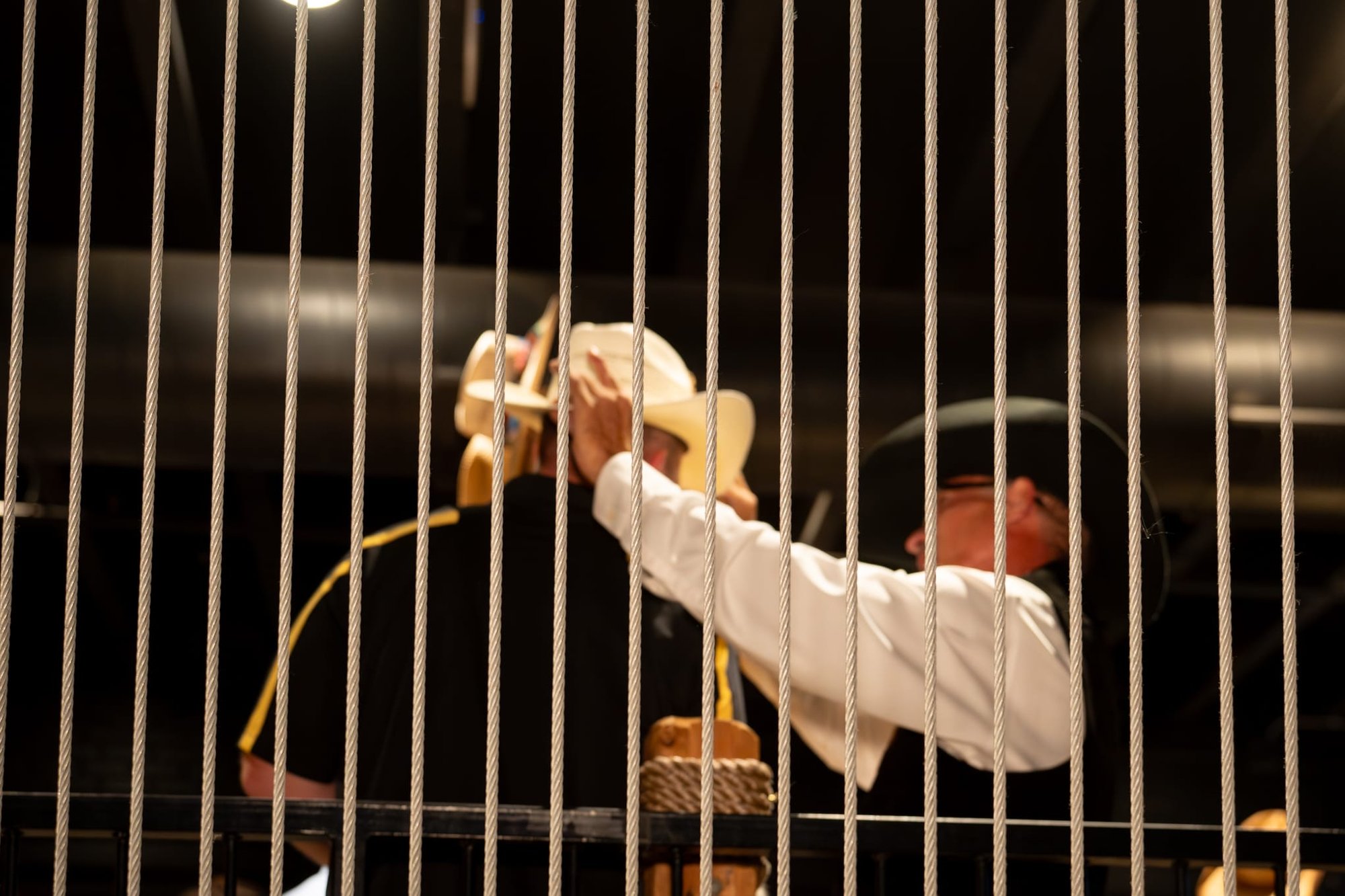 Wild Bill makes custom cowboy hats for Security 101’s Appreciation Event attendees at the Happiest Hour rooftop bar