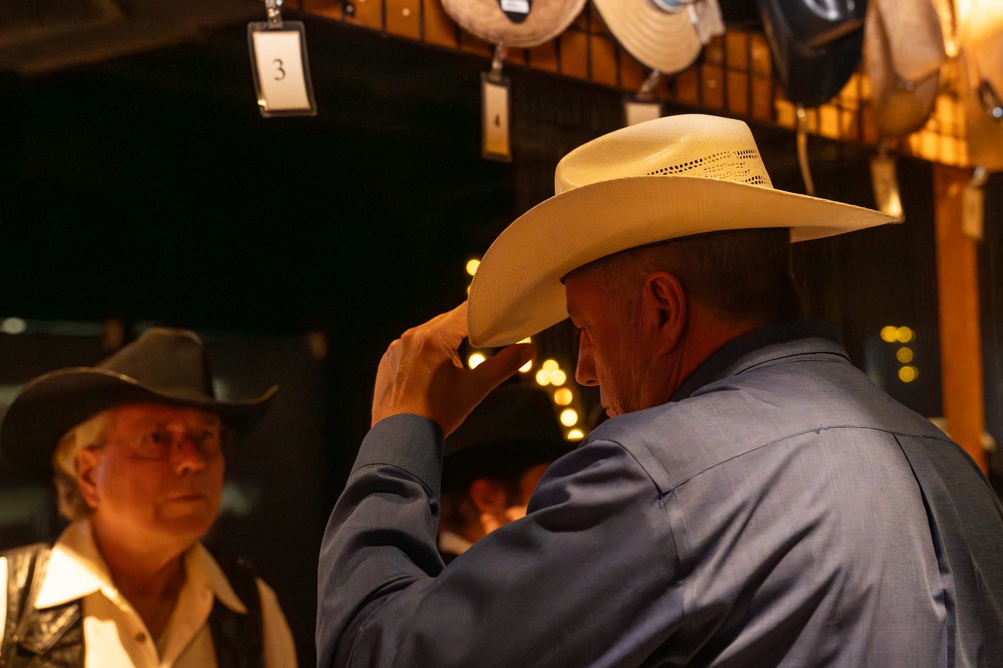 Wild Bill makes custom cowboy hats for Security 101’s Appreciation Event attendees at the Happiest Hour rooftop bar