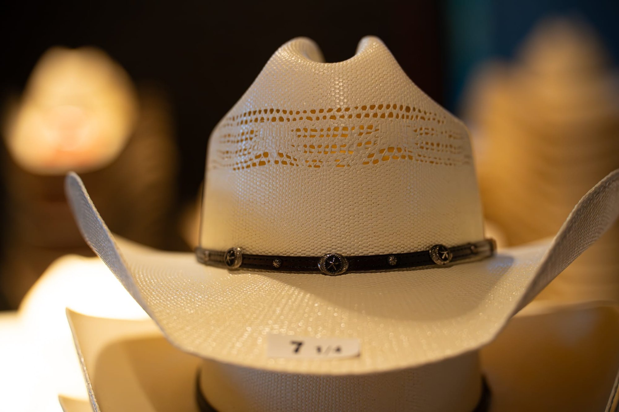 Wild Bill makes custom cowboy hats for Security 101’s Appreciation Event attendees at the Happiest Hour rooftop bar