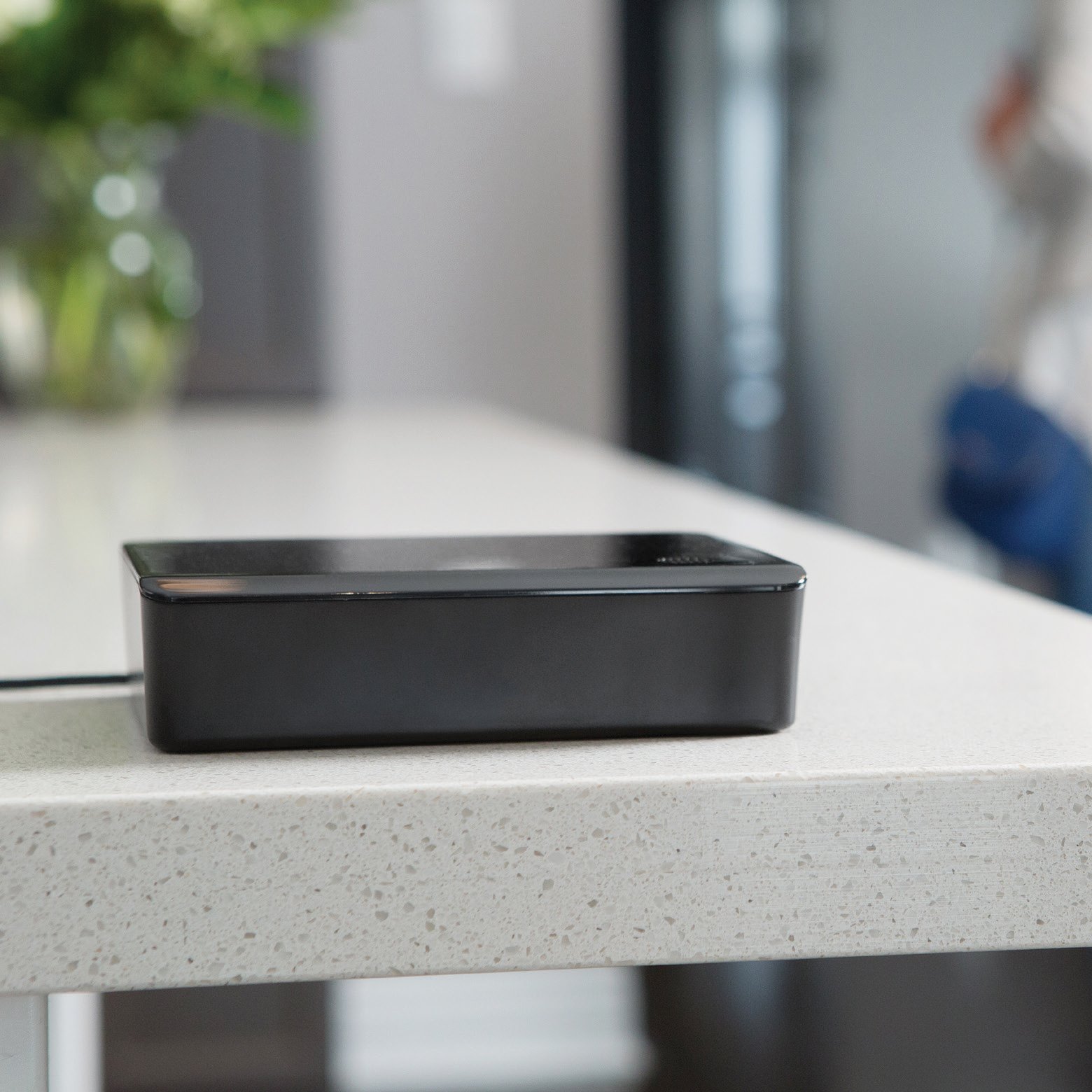 image of a smart device used for home automation sitting on a countertop